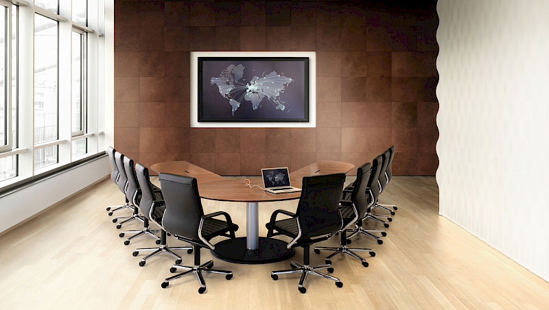 Variable use video conference room for hybrid collaboration of spatially distributed teams.